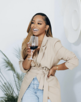 Carmen with a glass of wine