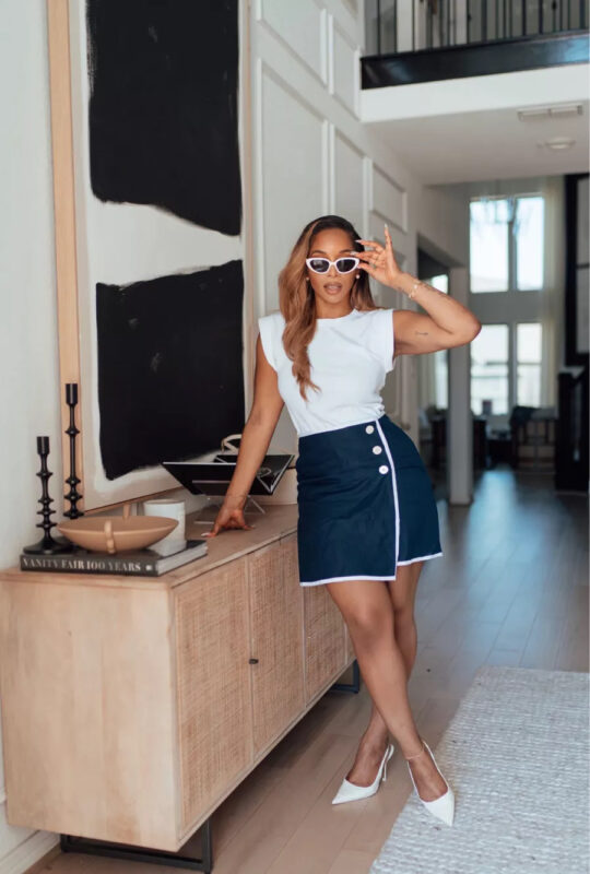 carmen posing in entryway