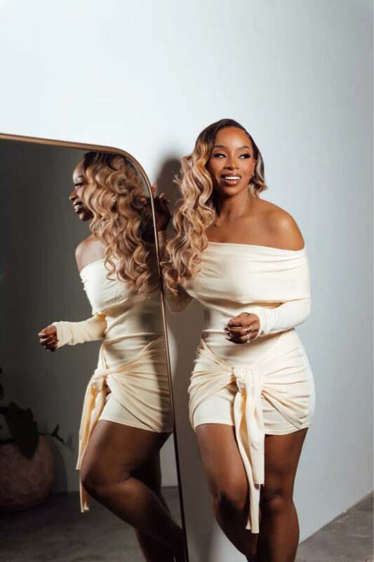 carmen posing in front of mirror