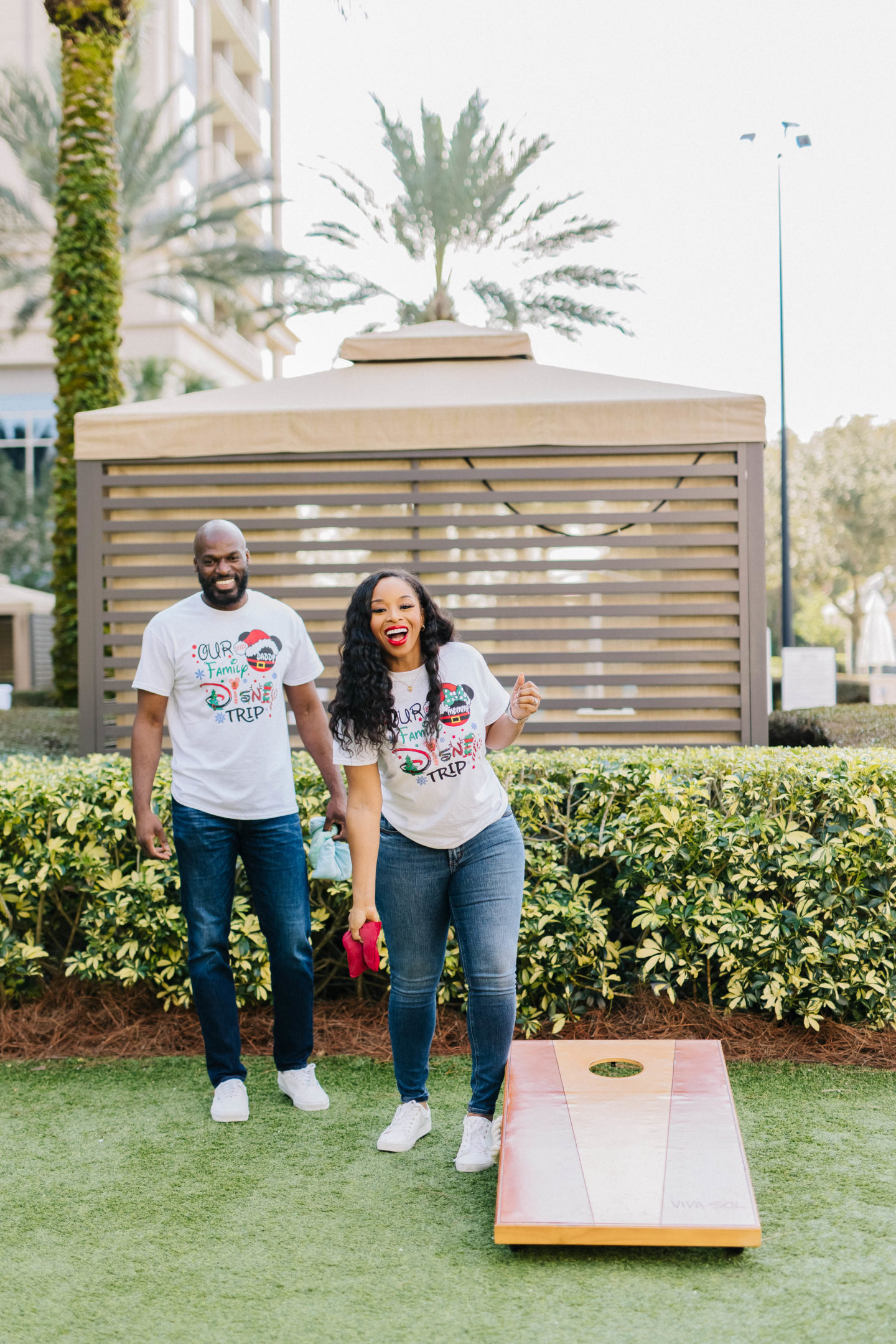Playing corn hole with my husband
